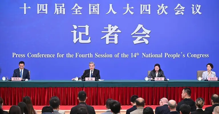 সংবাদ সম্মেলনে বক্তব্য দেন ওয়াং ই